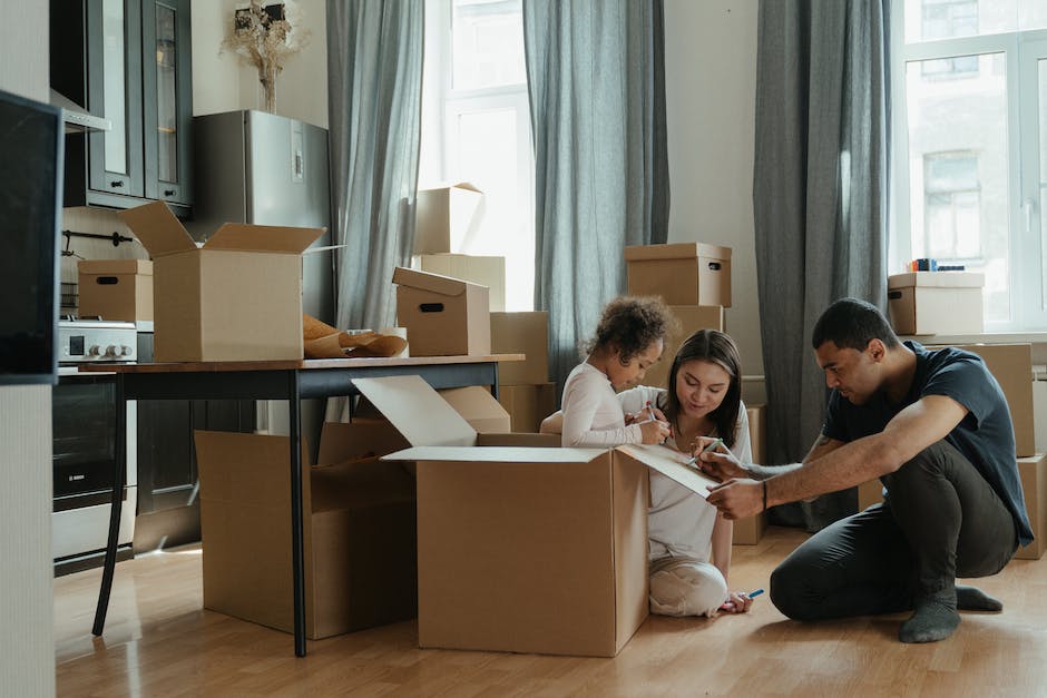 Image of a family packing up their belongings and preparing for a move