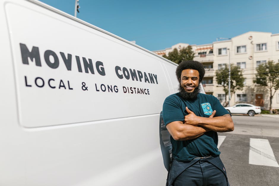 A group of movers loading a moving container, showcasing a collaborative partnership between movers and customers