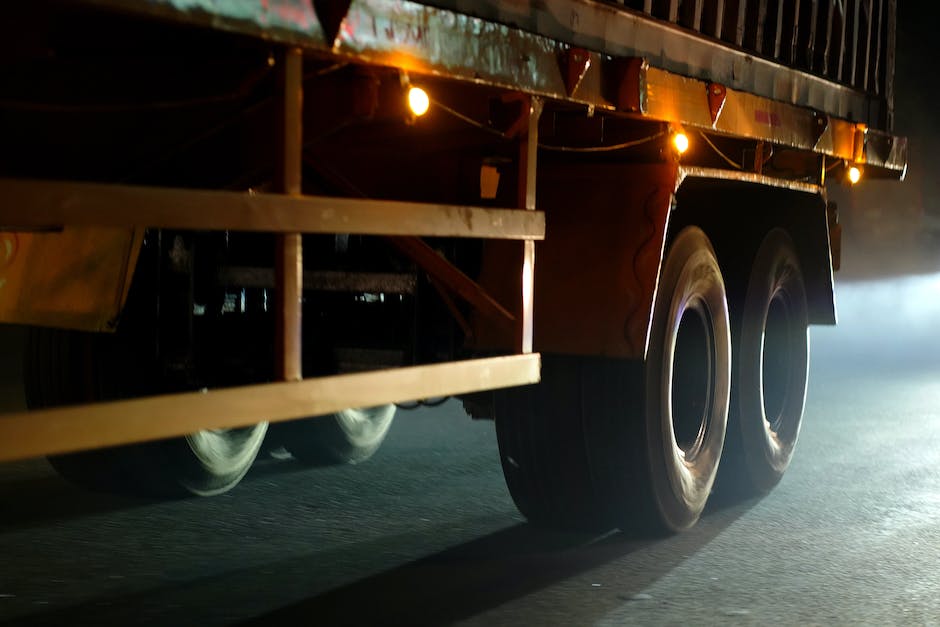 A professional moving company truck carrying items from one location to another.