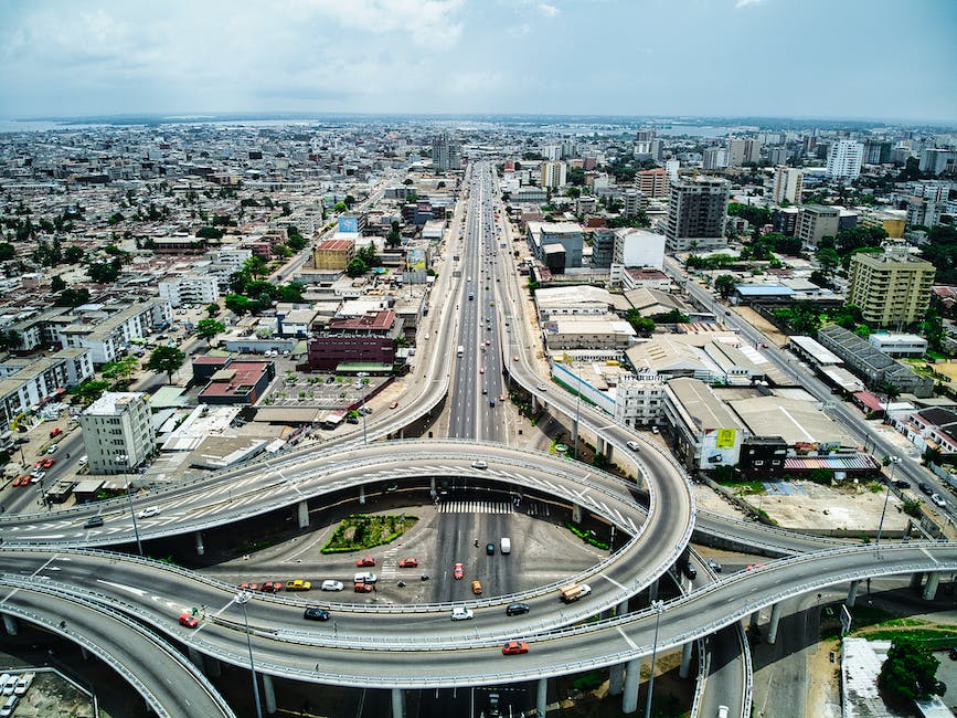 A road sign showing different highways merging together, symbolizing the choices and decisions one can make when optimizing their moving route.