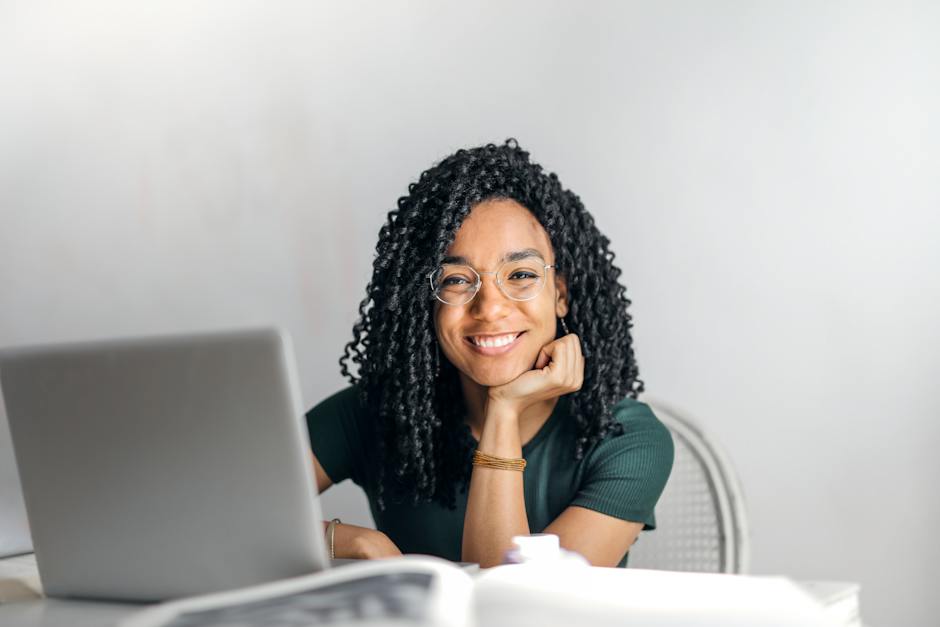 Image of a person analyzing online reviews with magnifying glass, representing the importance of investigating reviews and ratings for a scam-free moving experience.